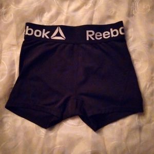 Woman's Reebox workout shorts. Black spandex material.